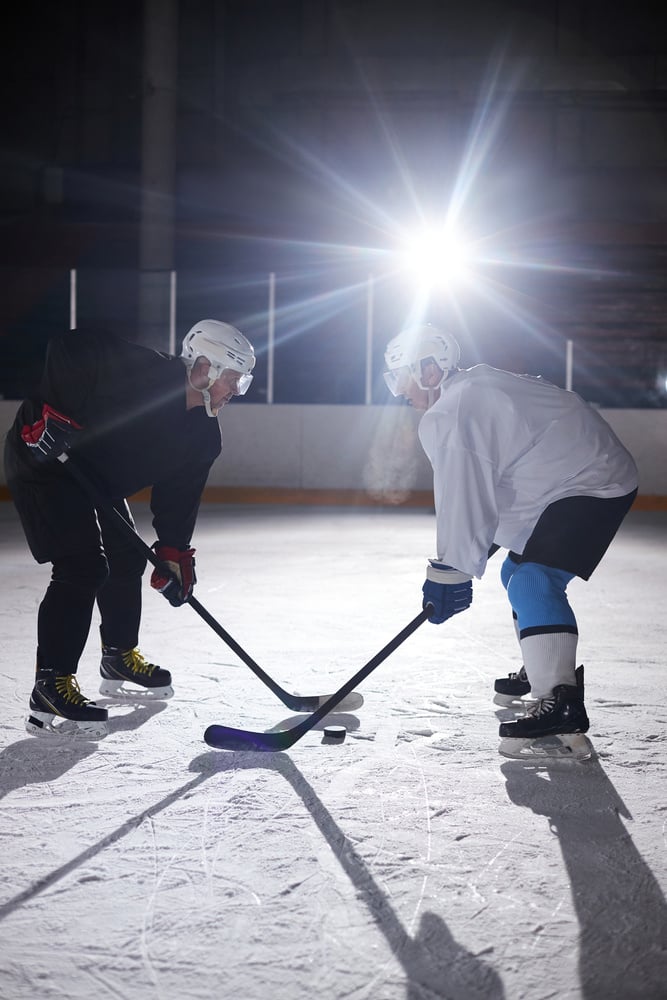 Men Playing Hockey